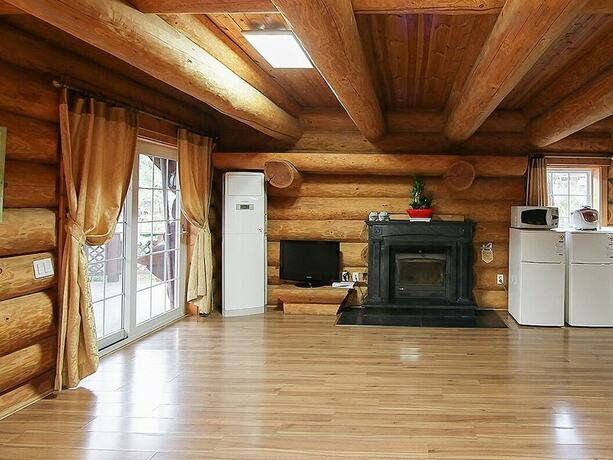 Imagen de la habitación del Hotel Sse Log Town. Foto 12