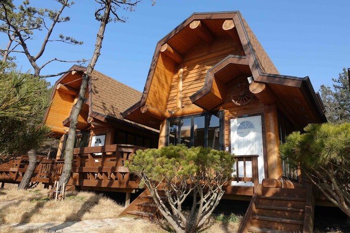 Imagen de la habitación del Hotel Sse Log Town. Foto 15