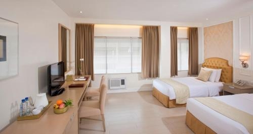 Imagen de la habitación del Hotel St Ellis. Foto 7