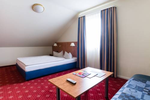 Imagen de la habitación del Hotel St. Georg, Bad Aibling. Foto 7