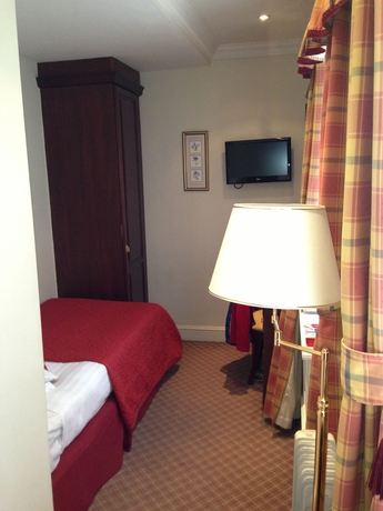 Imagen de la habitación del Hotel St George, Londres. Foto 8