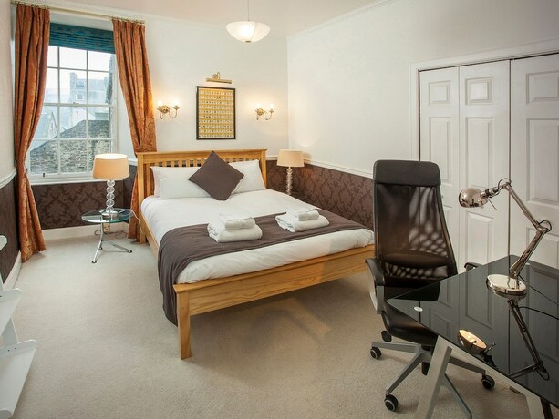 Imagen de la habitación del Hotel St. Giles Apartment. Foto 13