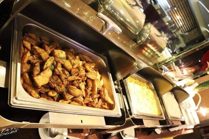 Imagen del bar/restaurante del Hotel St Giles Makati. Foto 3