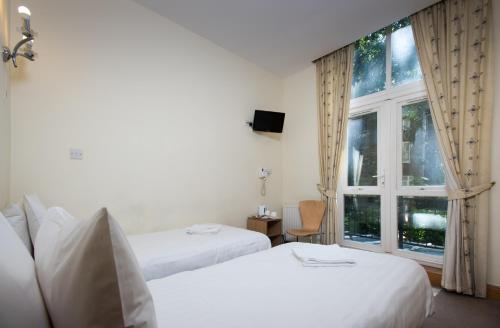 Imagen de la habitación del Hotel St Joseph. Foto 8