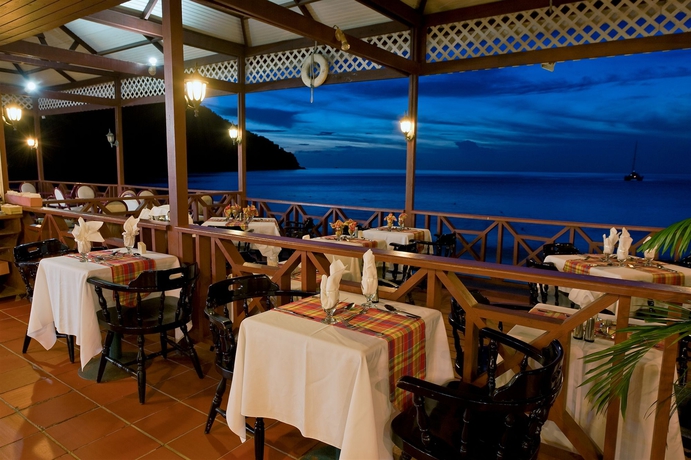 Imagen del bar/restaurante del Hotel St. Lucian by Rex Resorts. Foto 4