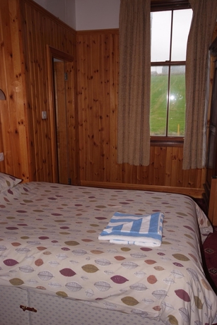 Imagen de la habitación del Hotel St Magnus Bay. Foto 11