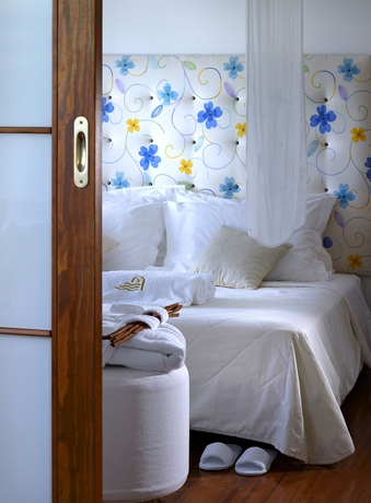 Imagen de la habitación del Hotel St. Nicolas Bay Resort and Villas. Foto 12