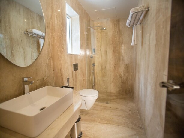 Imagen de la habitación del Hotel St Parklane Airport Chennai. Foto 24