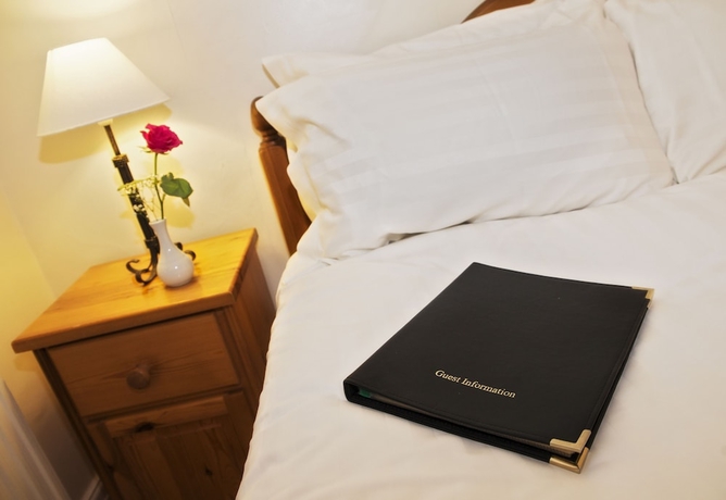 Imagen de la habitación del Hotel St Raphael Guest House. Foto 8