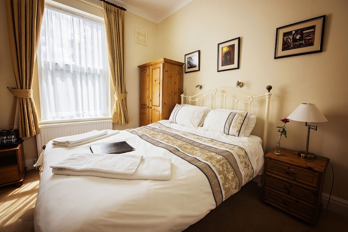 Imagen de la habitación del Hotel St Raphael Guest House. Foto 9