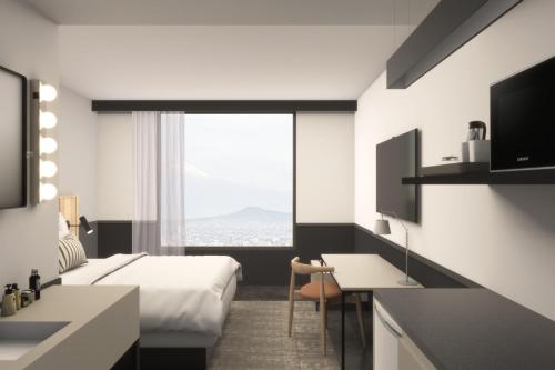 Imagen de la habitación del Hotel Stad&iacute;a Suites Quer&eacute;taro. Foto 2