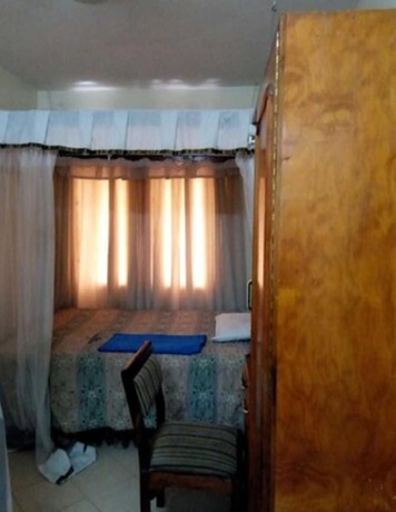 Imagen de la habitación del Hotel Stadium Holiday Inn Mombasa. Foto 9