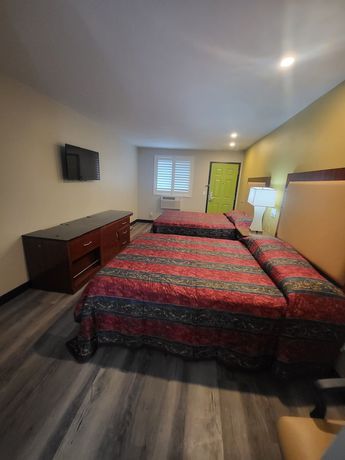 Imagen de la habitación del Hotel Stadium Inn and Spas. Foto 2