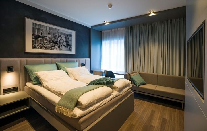 Imagen de la habitación del Hotel Stadl. Foto 19