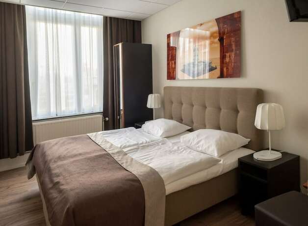 Imagen de la habitación del Hotel Stadsherberg de Poshoorn. Foto 19