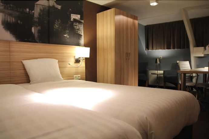Imagen de la habitación del Hotel Stadshotel De Klok. Foto 7