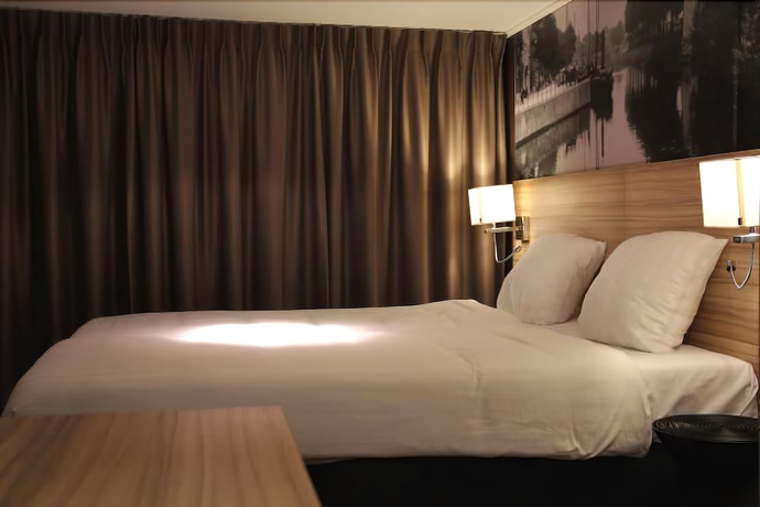 Imagen de la habitación del Hotel Stadshotel De Klok. Foto 15