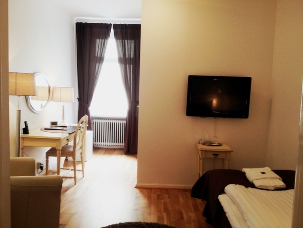 Imagen de la habitación del Hotel Stadshotellet Kristianstad. Foto 11