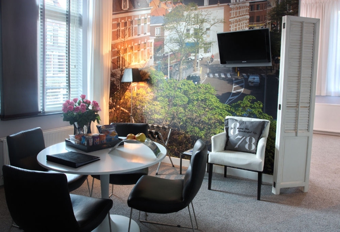 Imagen de los interiores del Hotel Stadsvilla Mozaic Den Haag. Foto 10