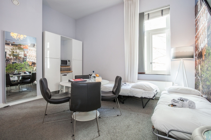 Imagen de los interiores del Hotel Stadsvilla Mozaic Den Haag. Foto 11