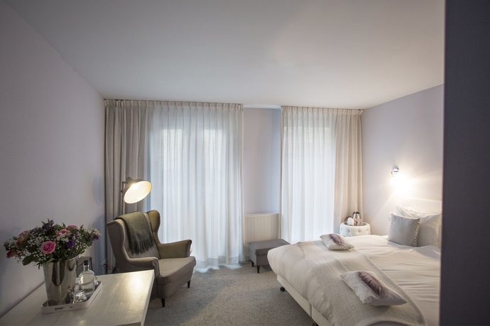 Imagen de la habitación del Hotel Stadsvilla Mozaic Den Haag. Foto 3