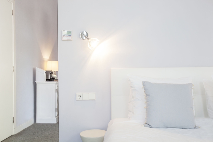 Imagen de la habitación del Hotel Stadsvilla Mozaic Den Haag. Foto 4