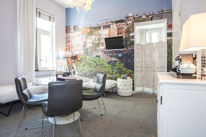 Imagen de los interiores del Hotel Stadsvilla Mozaic Den Haag. Foto 15