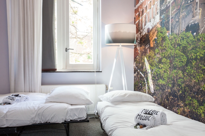 Imagen de la habitación del Hotel Stadsvilla Mozaic Den Haag. Foto 7