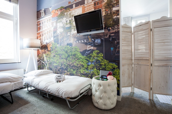 Imagen de la habitación del Hotel Stadsvilla Mozaic Den Haag. Foto 8