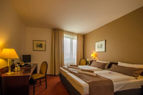 Imagen de la habitación del Hotel Stadt Aurich. Foto 11
