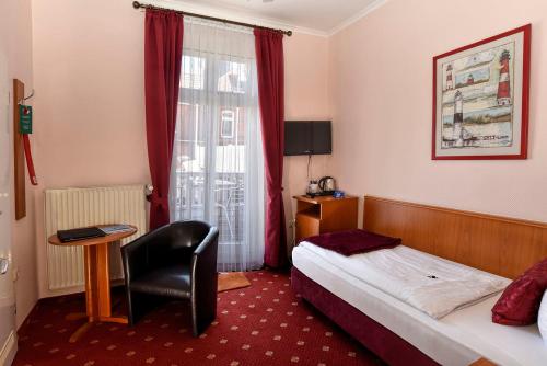 Imagen de la habitación del Hotel Stadt Hamburg, Heiligenhafen. Foto 5