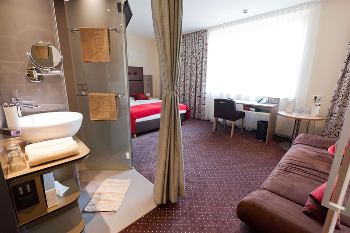 Imagen de la habitación del Hotel Stadthalle. Foto 2