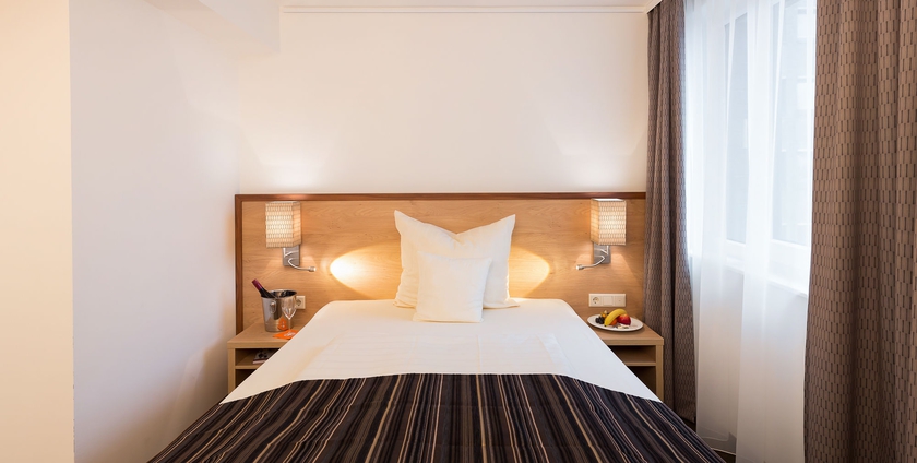 Imagen de la habitación del Hotel Stadthotel Am Römerturm. Foto 8