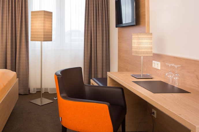 Imagen de la habitación del Hotel Stadthotel Am Römerturm. Foto 11