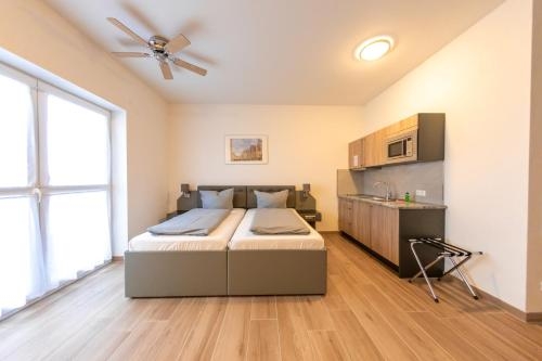 Imagen de la habitación del Hotel Stadthotel Donauw&ouml;rth. Foto 8