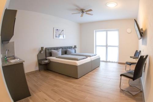 Imagen de la habitación del Hotel Stadthotel Donauw&ouml;rth. Foto 9