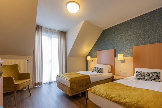 Imagen de la habitación del Hotel Stadthotel. Foto 11