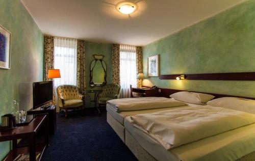Imagen de la habitación del Hotel Stadt-hotel. Foto 8