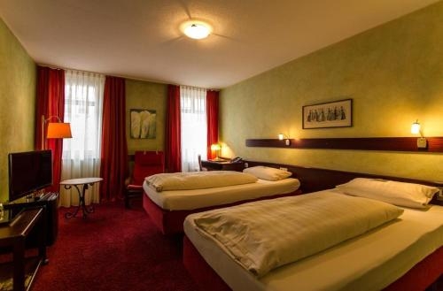 Imagen de la habitación del Hotel Stadt-hotel. Foto 9