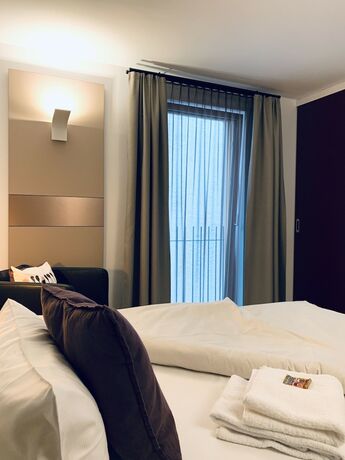 Imagen de la habitación del Hotel Stadthotel Kachelofen. Foto 11