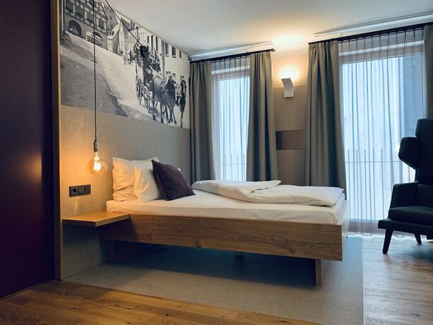 Imagen de la habitación del Hotel Stadthotel Kachelofen. Foto 12