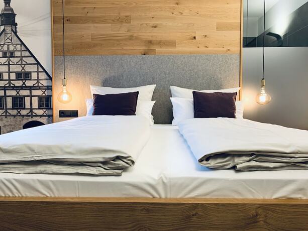 Imagen de la habitación del Hotel Stadthotel Kachelofen. Foto 13