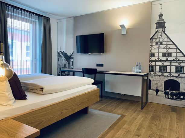 Imagen de la habitación del Hotel Stadthotel Kachelofen. Foto 14