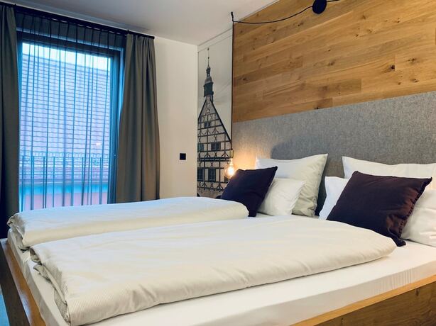 Imagen de la habitación del Hotel Stadthotel Kachelofen. Foto 18