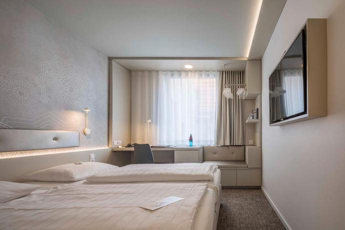Imagen de la habitación del Hotel Stadthotel M&uuml;nster. Foto 9