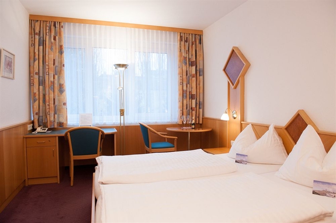 Imagen de la habitación del Hotel Stadtoase Kolping. Foto 5