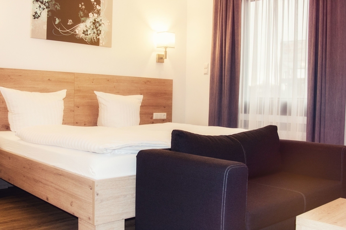Imagen de la habitación del Hotel Stadtvilla Central. Foto 10