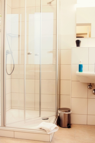 Imagen de la habitación del Hotel Stadtvilla Central. Foto 11