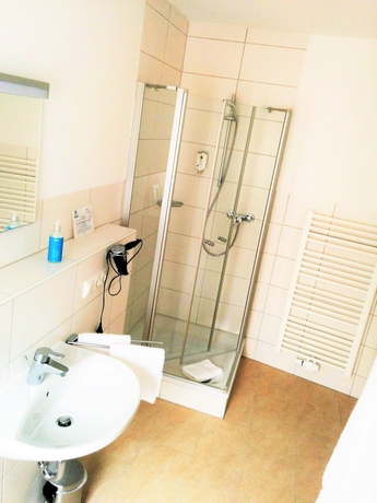 Imagen de la habitación del Hotel Stadtvilla Central. Foto 16