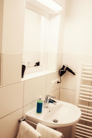 Imagen de la habitación del Hotel Stadtvilla Central. Foto 18